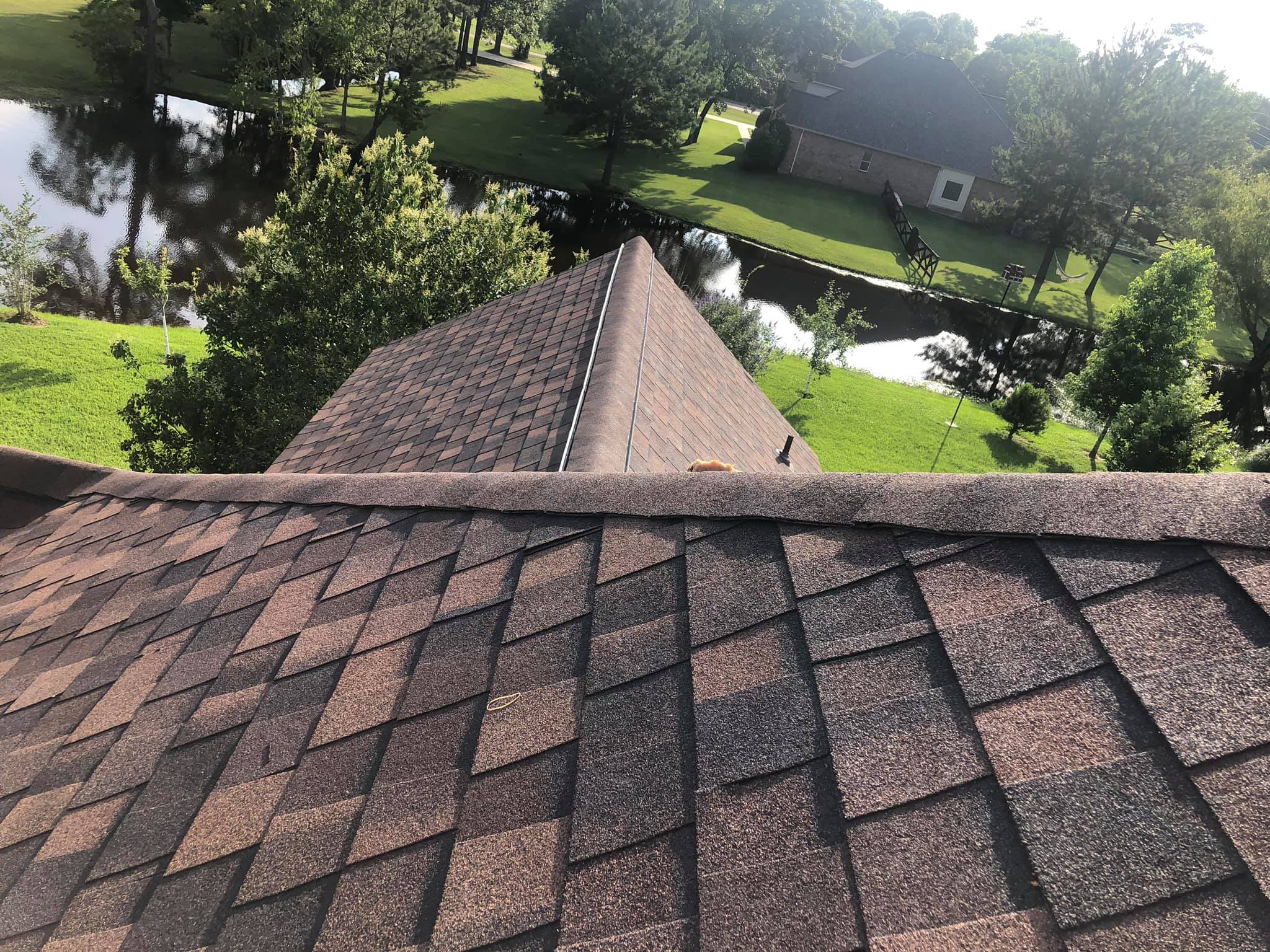 RocStout Roofing and Exterior in Bryan, Texas - a picture of a roof with lake