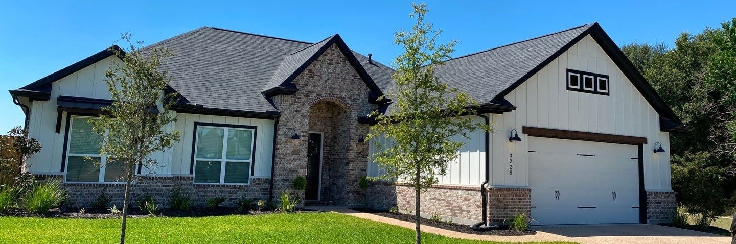 RocStout Roofing and Exterior in Bryan, Texas - a picture of a new beautiful house roof