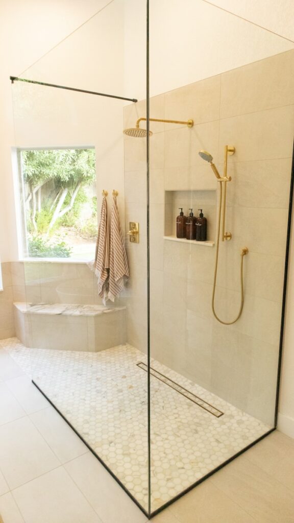 white bathtub with shower curtain