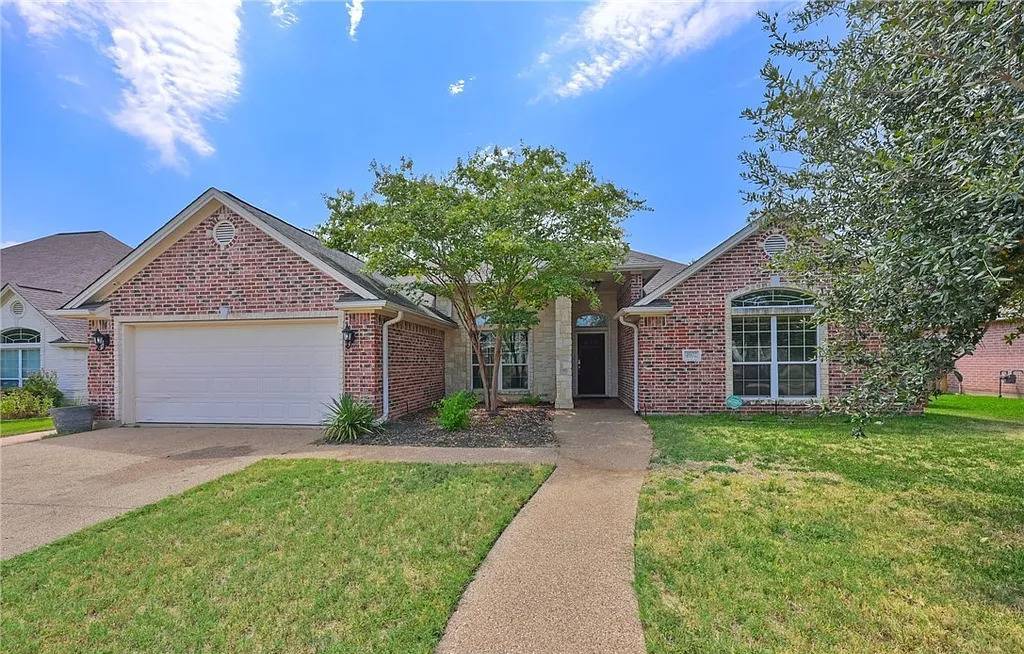Home, roof style, yard size, and sidewalk typical of the Tiffany Park area of Bryan, TX.